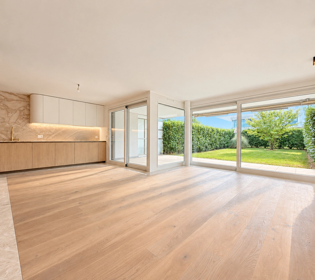 UNE ADRESSE PRIVILÉGIÉE À DEUX PAS DU LAC – ÉLÉGANT APPARTEMENT EN REZ-DE-JARDIN