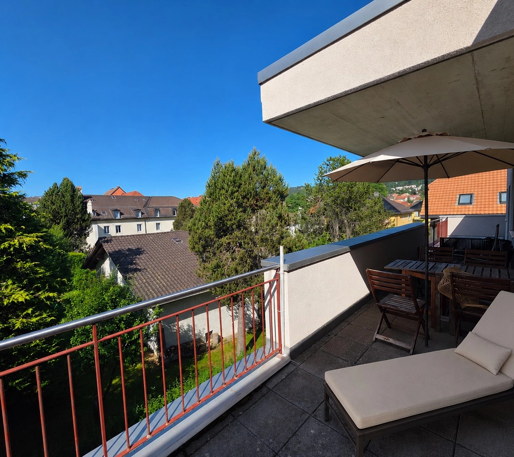 Appartement en attique avec  terrasse, garage double et place de parc extérieure