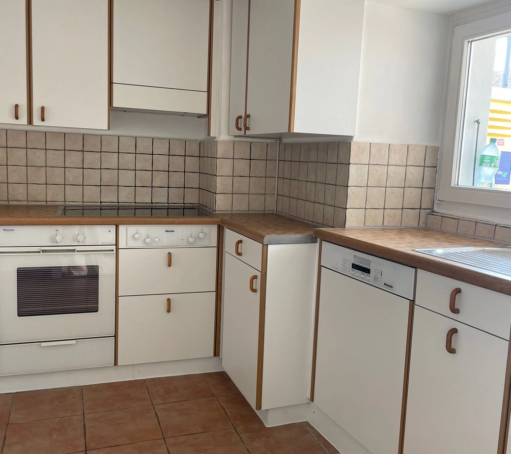 Appartement de 4 pièces duplex au rez