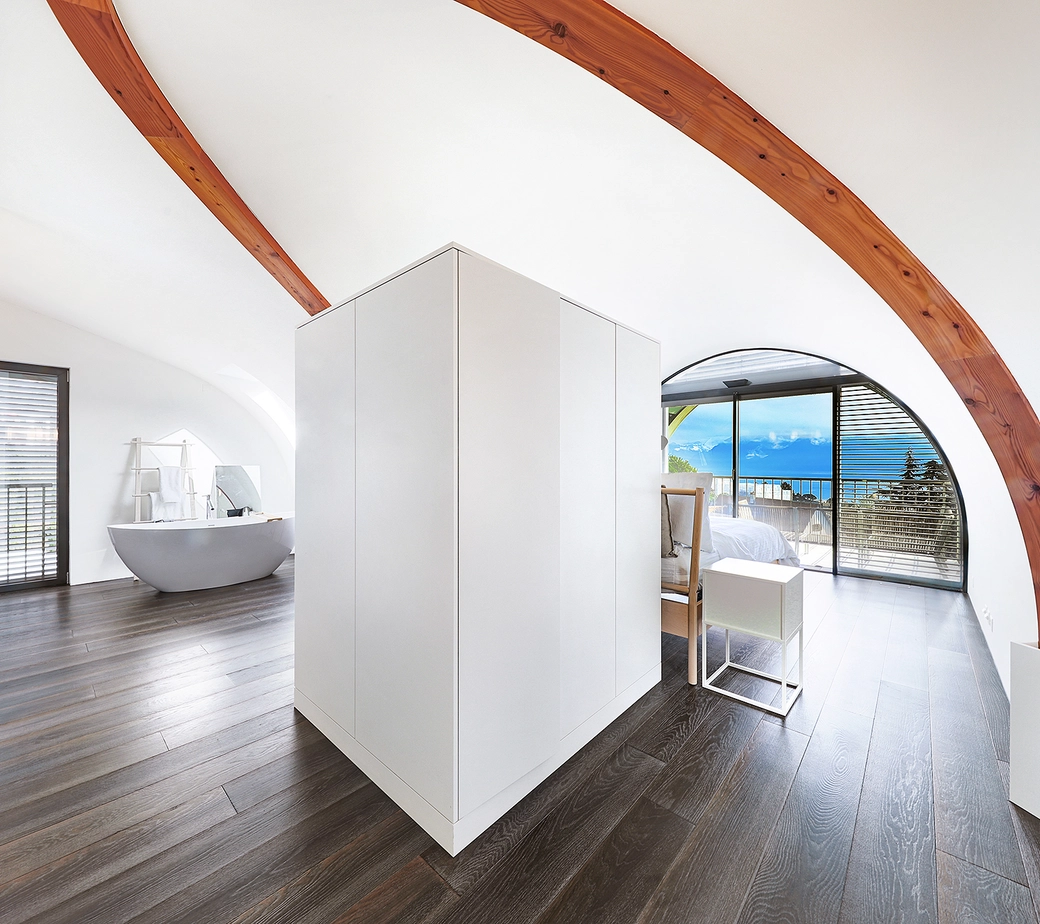 UN CHEF D'OEUVRE ARCHITECTURAL AVEC UNE SUBLIME VUE SUR LE LAC & LES ALPES