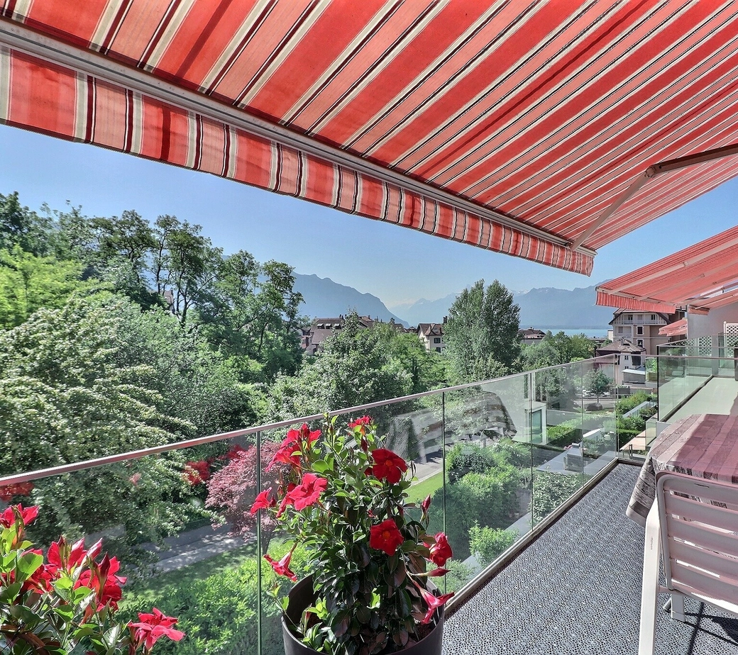POUR INVESTISSEURS: APPARTEMENT LOUE DE 5,5 PIECES DANS UN QUARTIER TRES CALME AVEC UNE BELLE VUE