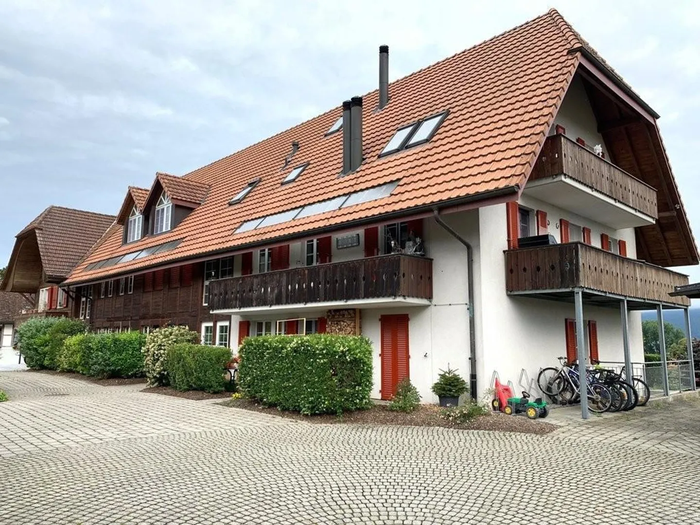 Maisonette apartment with garden seating area and view of Lake Biel - Photo 1 of 12