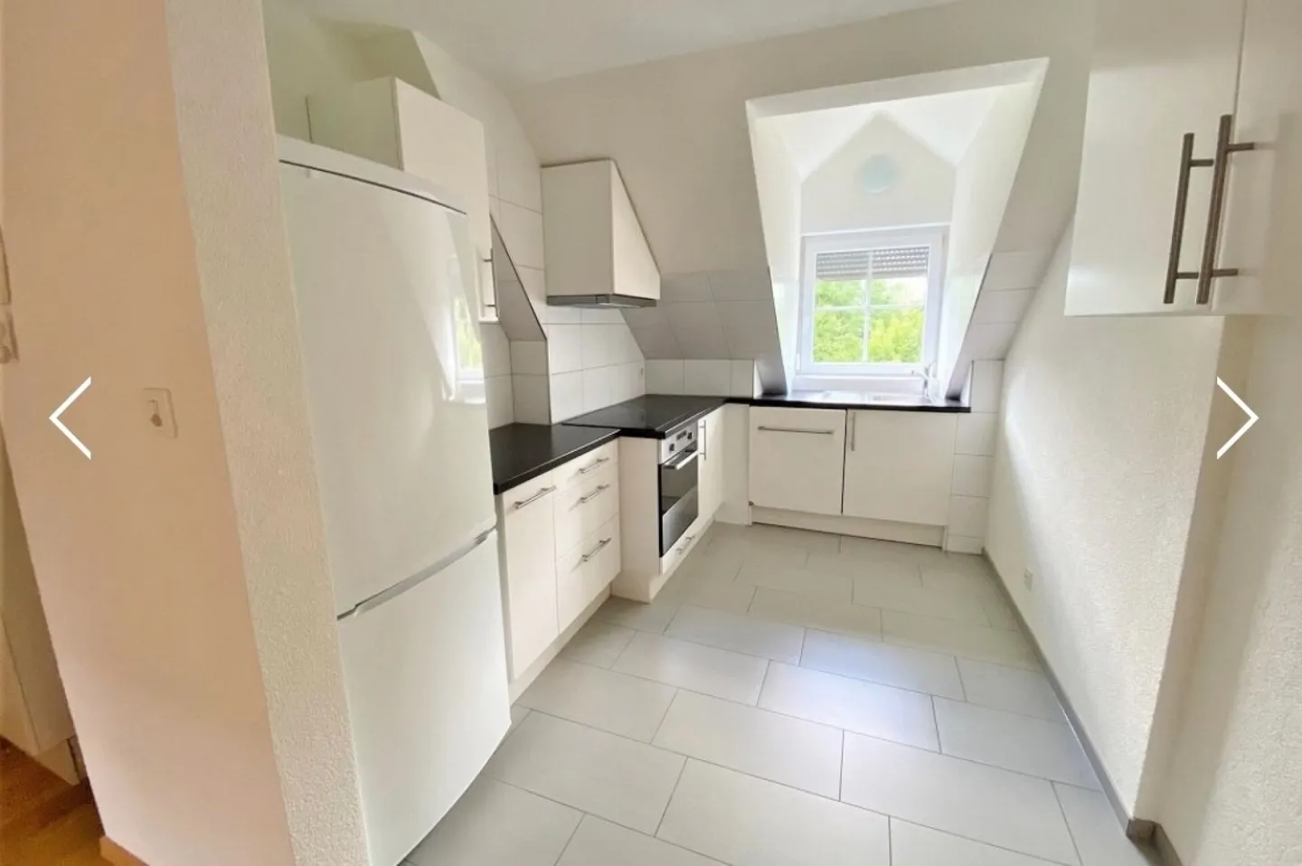 Charmante Dachwohnung in Birr - Foto 3 von 7