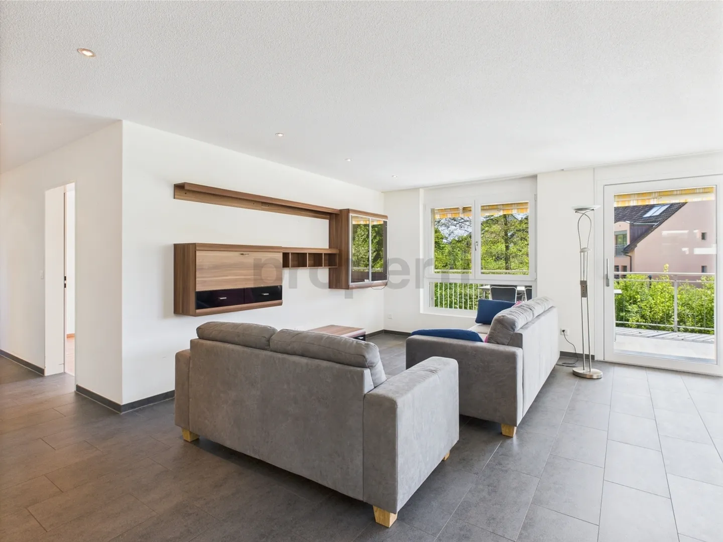 Enjoy the peace and the view of greenery from the large balcony of your new home - Photo 4 of 10