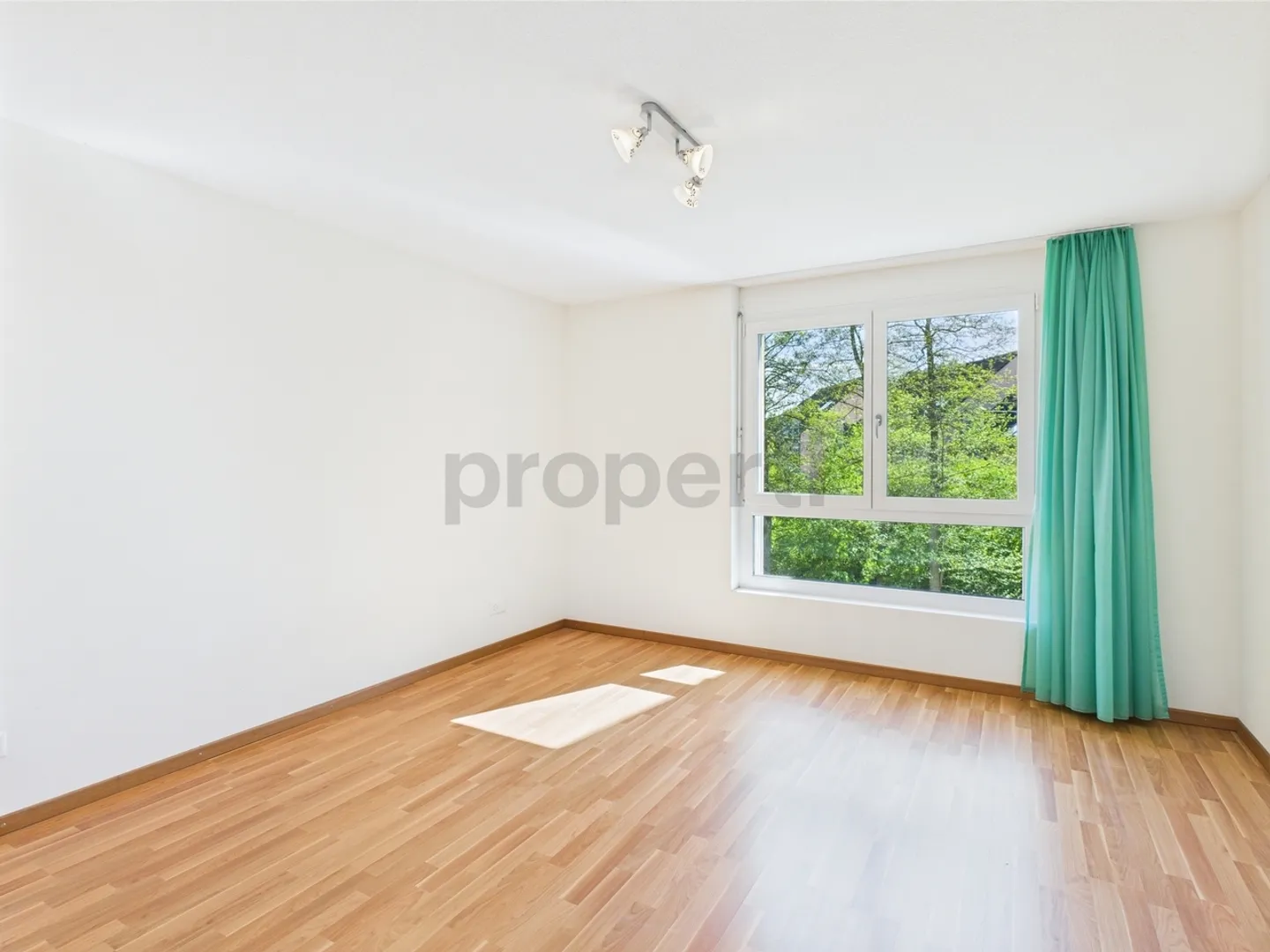 Enjoy the peace and the view of greenery from the large balcony of your new home - Photo 7 of 10