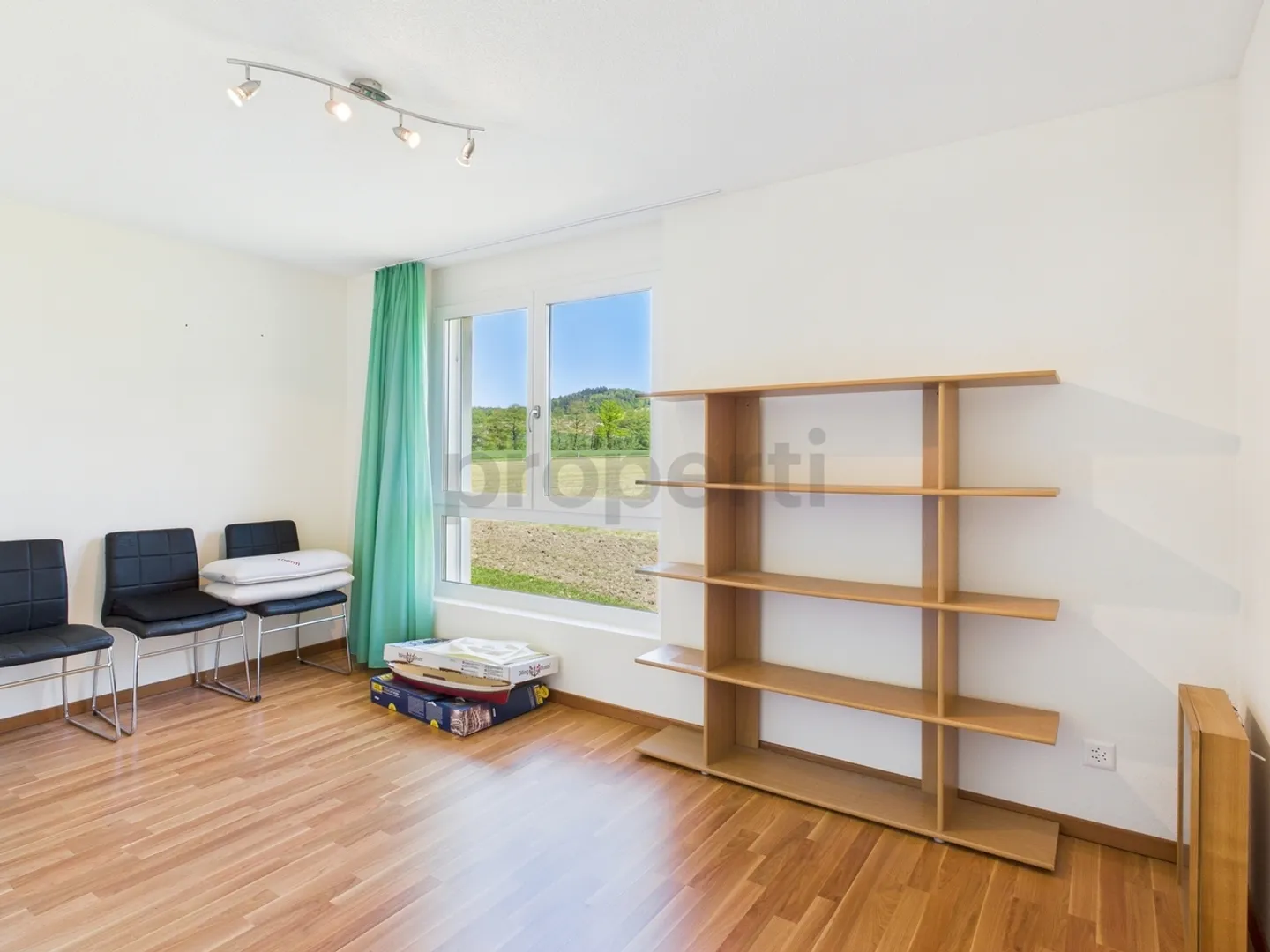 Enjoy the peace and the view of greenery from the large balcony of your new home - Photo 8 of 10