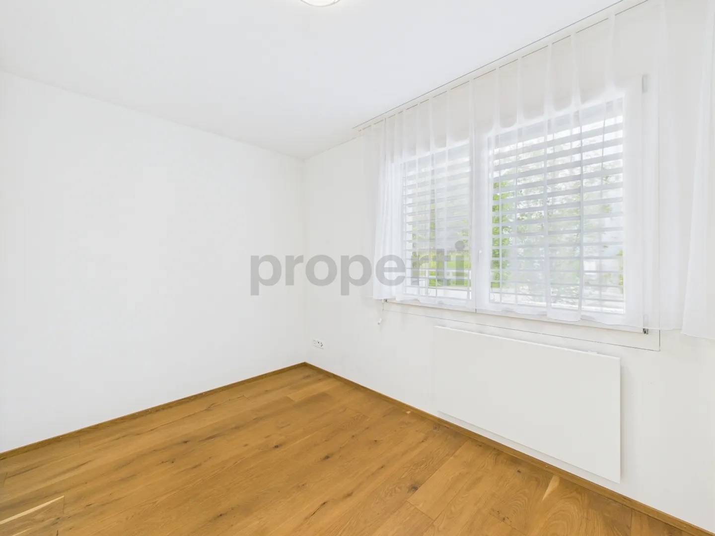Detached zero-energy house with mountain view, studio & guest apartment - Quiet prime location in Schattdorf! - Photo 8 of 13