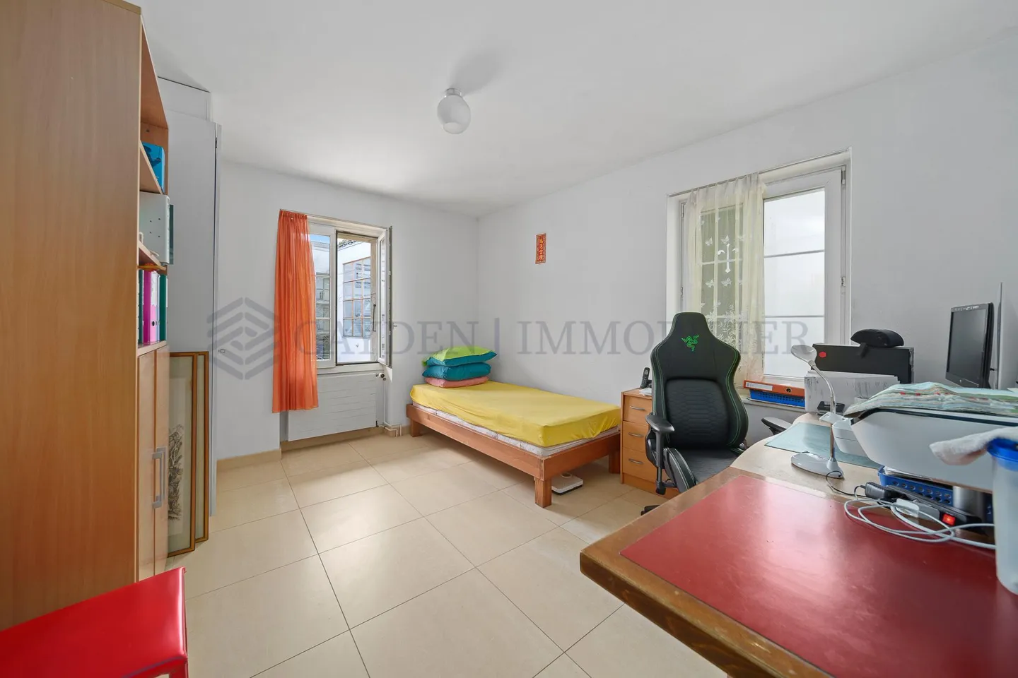 Mixed-Use Building in Bernex - Photo 8 of 17