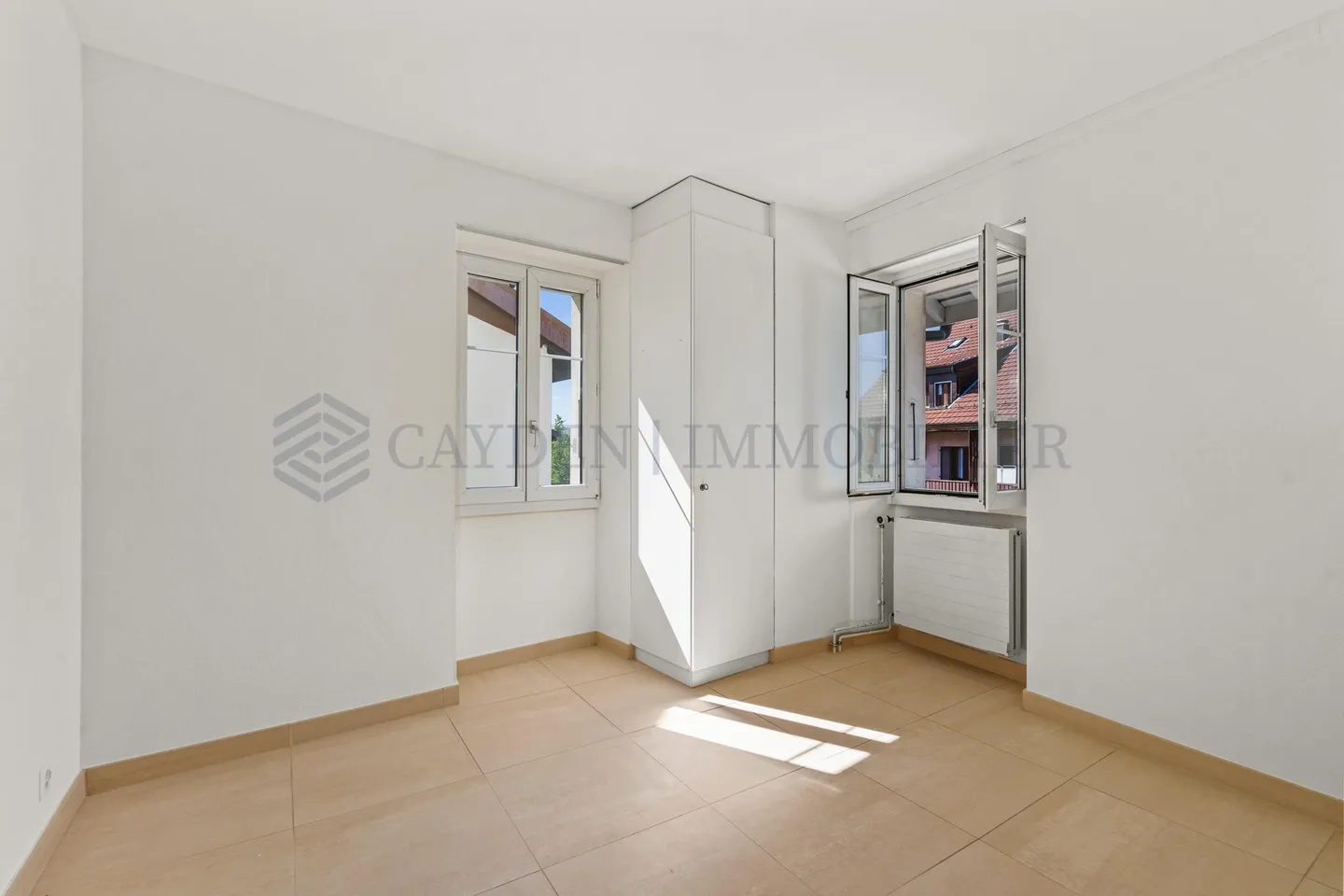 Mixed-Use Building in Bernex - Photo 10 of 17