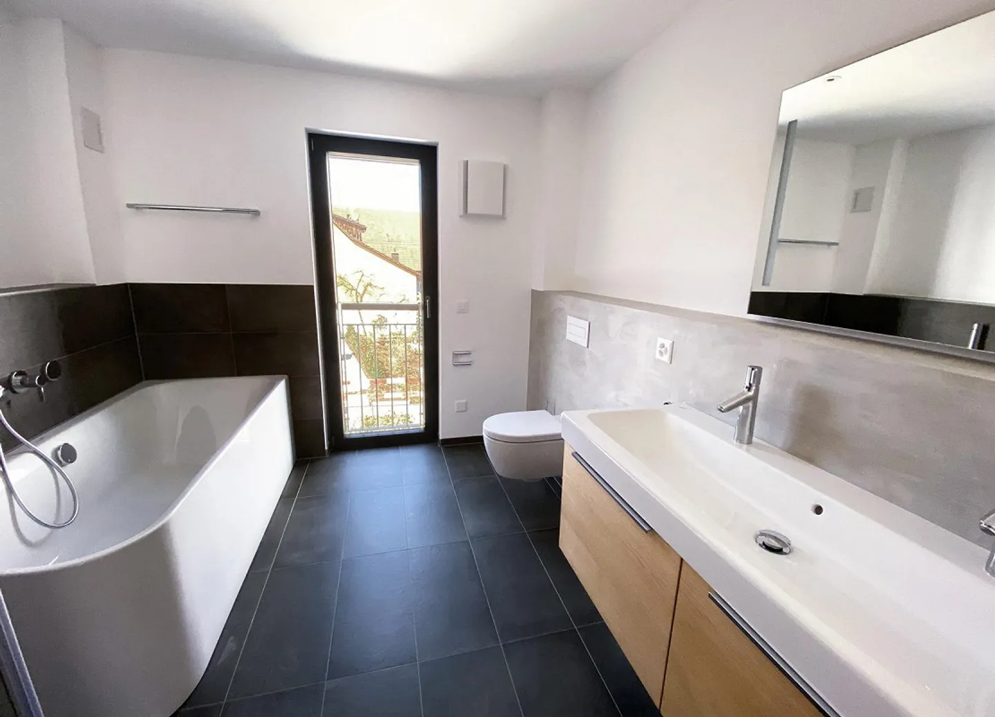 Stimmiges Einfamilienhaus in baubiologischer Bauweise - Foto 5 von 5