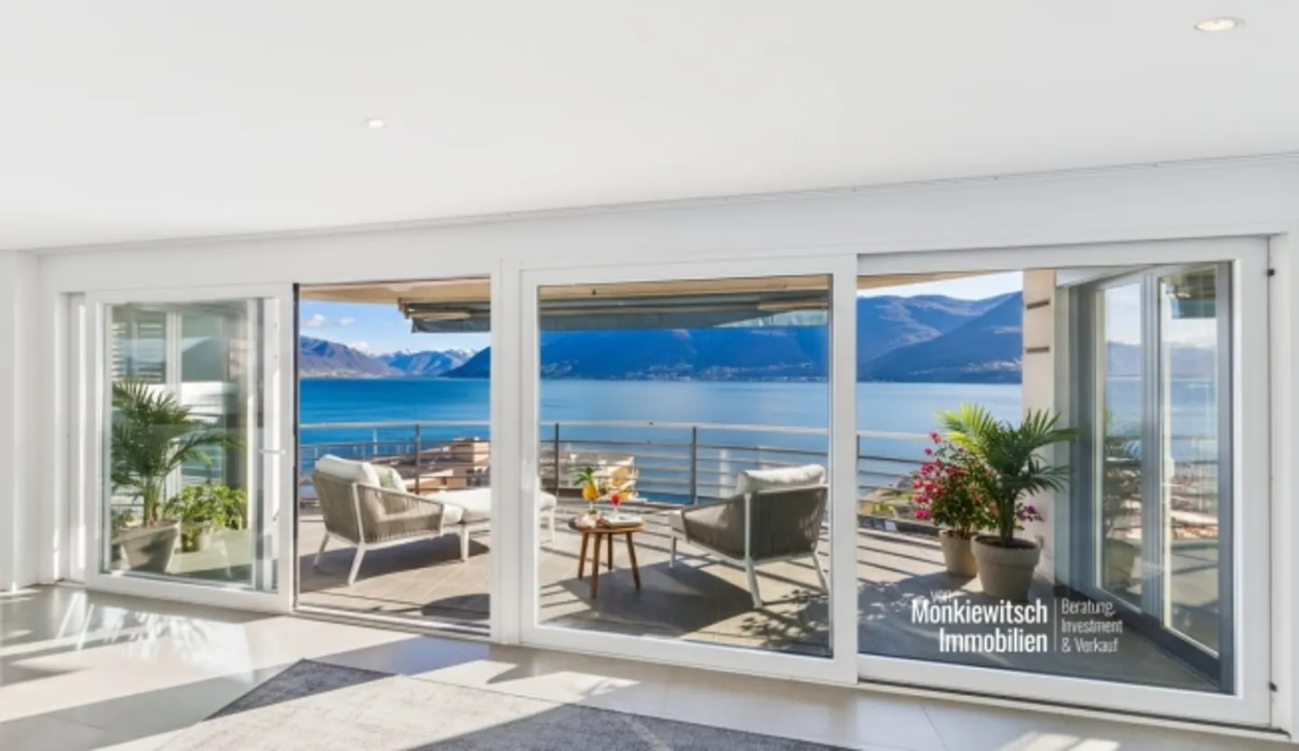 Luxury Attic Apartment with Lake View - Photo 1 of 12