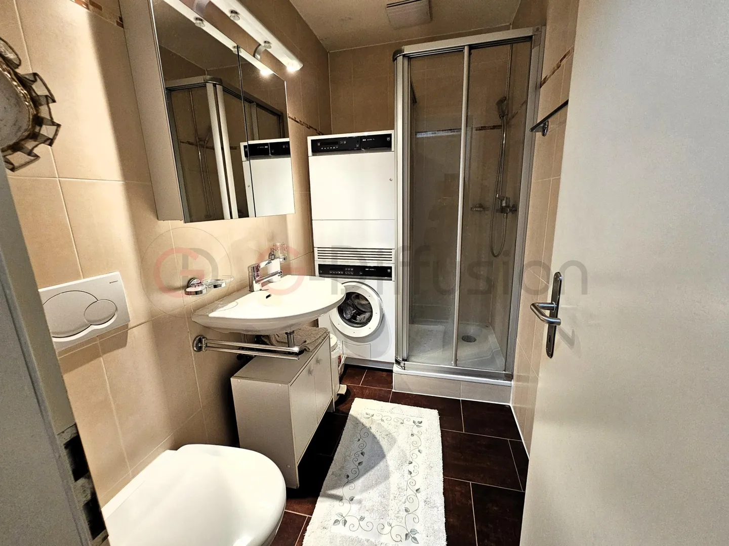 Appartement Charmant avec Vue sur le Lac - Photo 9 sur 16