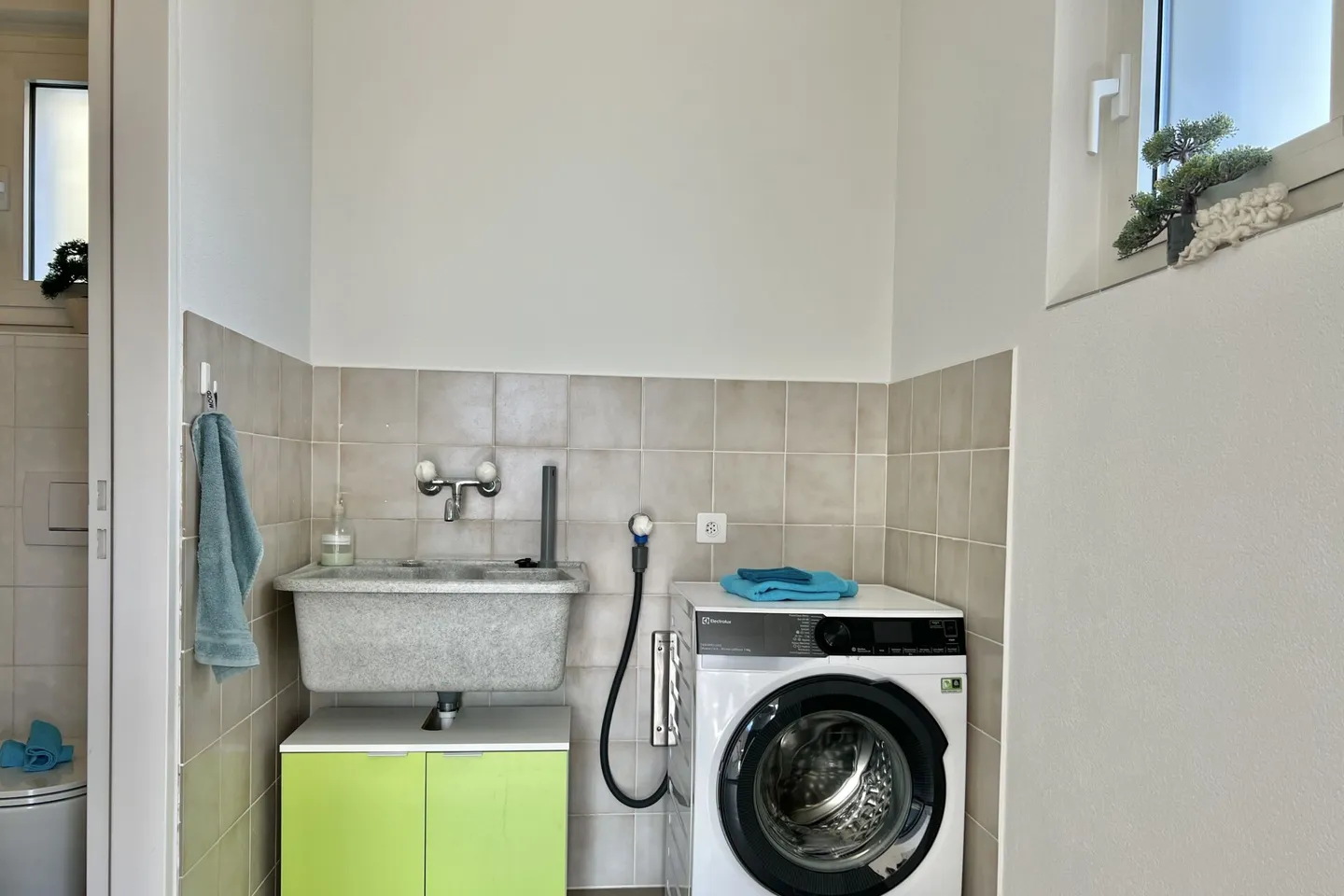Modernes Familienhaus mit Garten - Foto 45 von 50