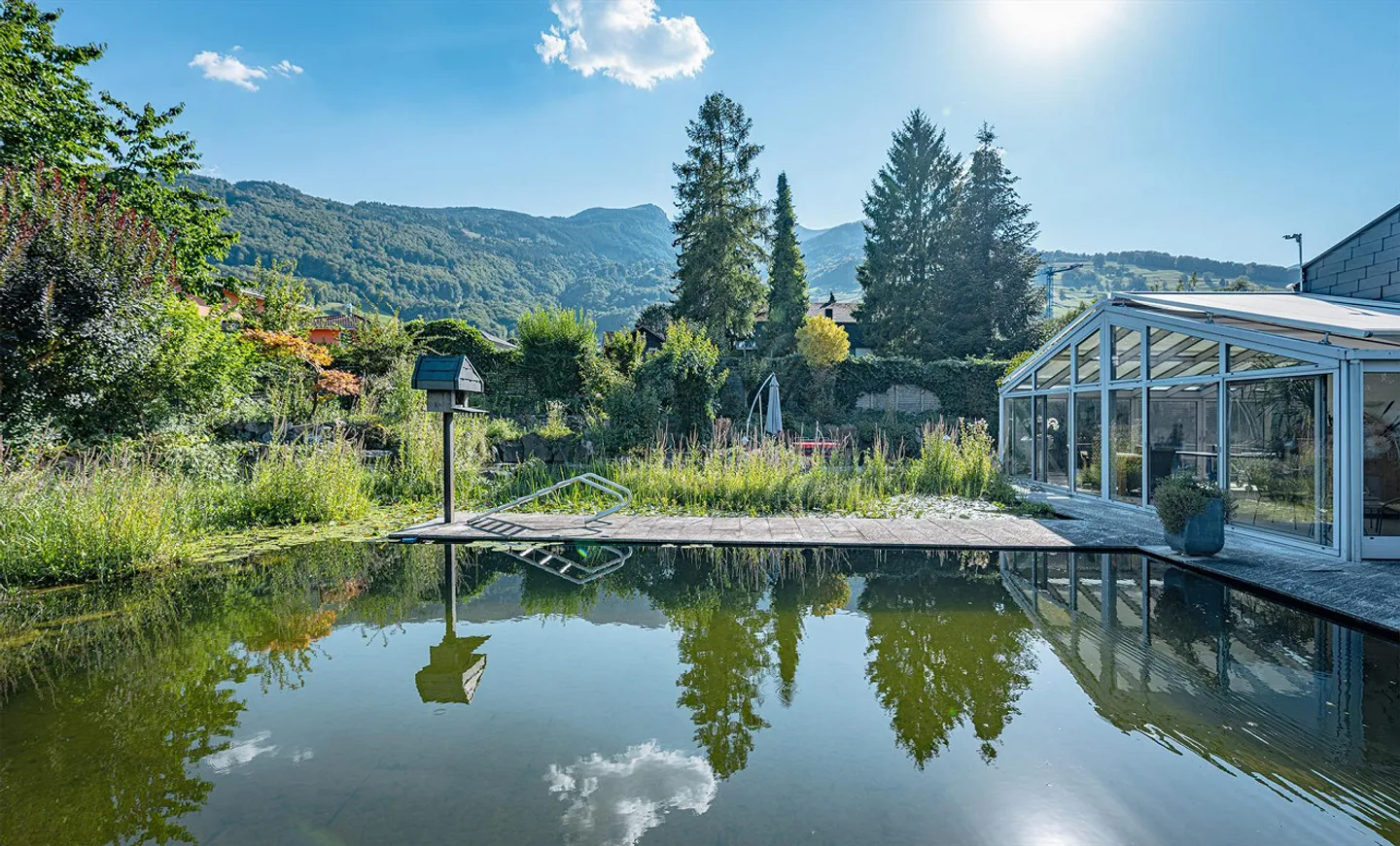 SINGLE-FAMILY HOUSE WITH EXTRAORDINARY GARDEN OASIS AND SWIMMING POND - Photo 4 of 5