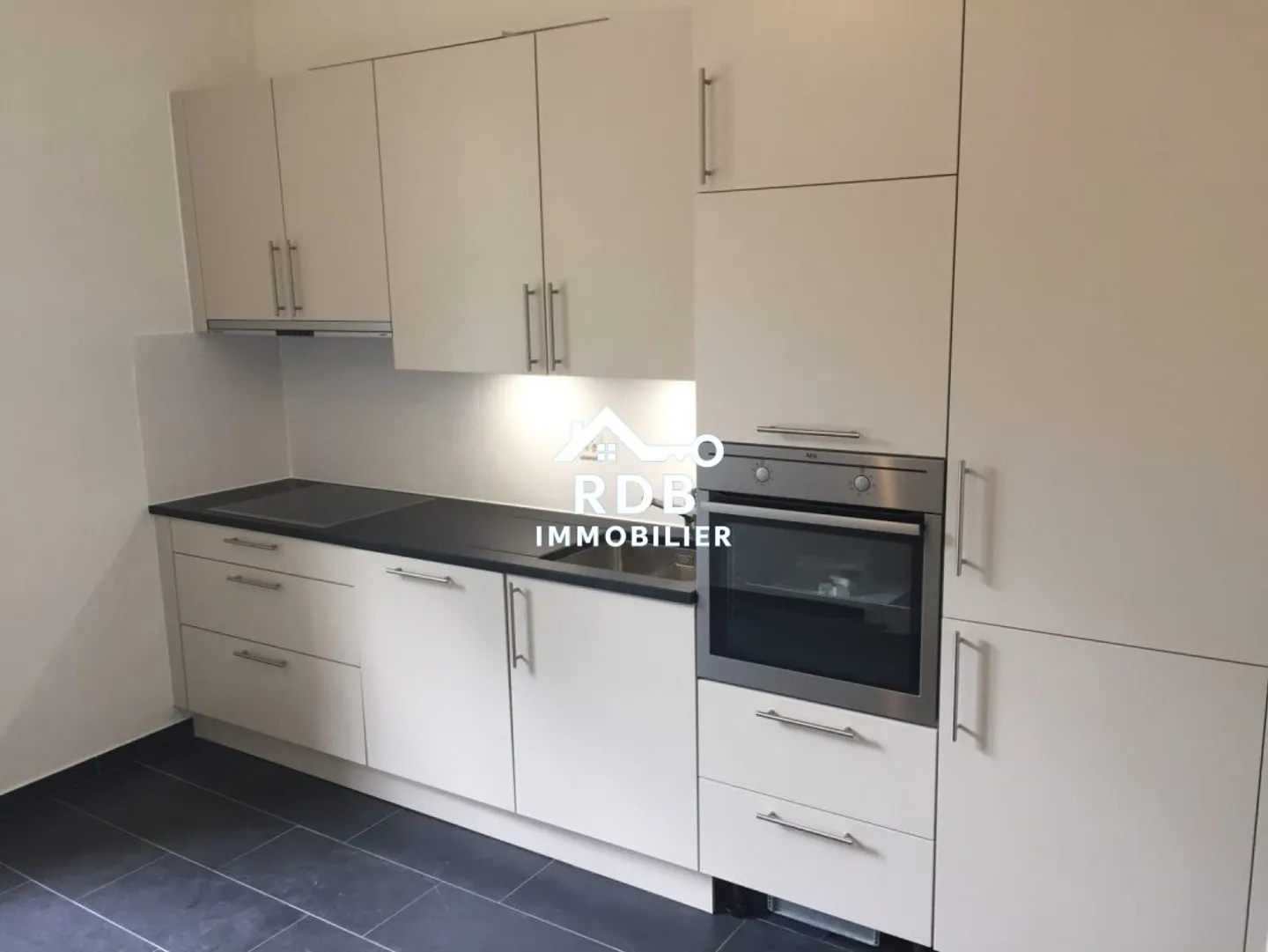 Appartement de 2,5 pièces au rez-de-chaussée à Chêne-Bougeries 1224 - Photo 1 sur 6