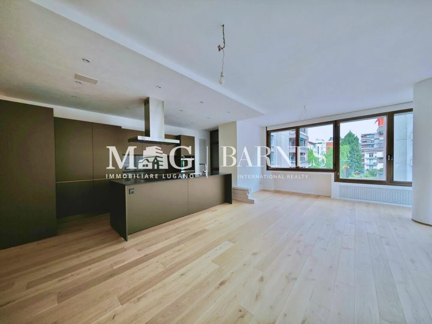 Lugano, Cassarate Apartment - RENOVATED - well laid out in a flat area, 3.5 rooms - Photo 1 of 10