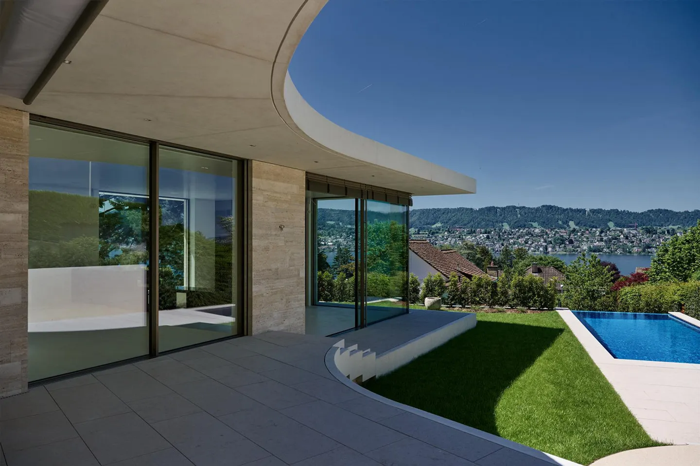 Villa neuve exclusive avec vue sur le lac, piscine extérieure et jardin idyllique - Photo 7 sur 9