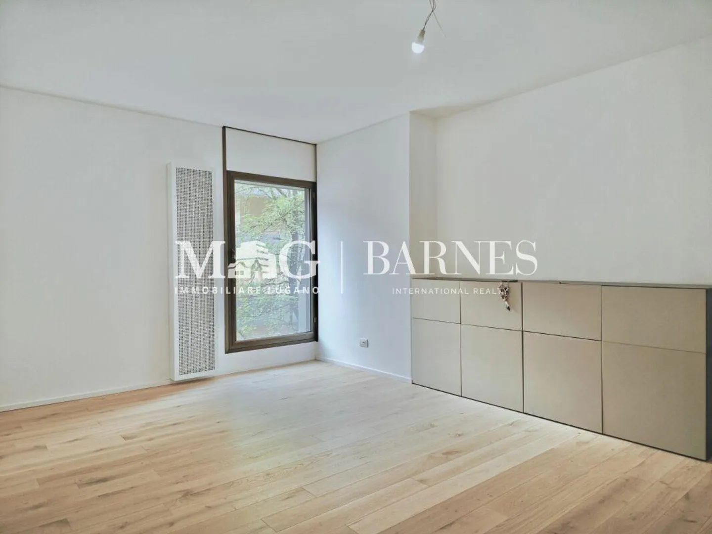 Lugano, Cassarate Apartment - RENOVATED - well laid out in a flat area, 3.5 rooms - Photo 6 of 10