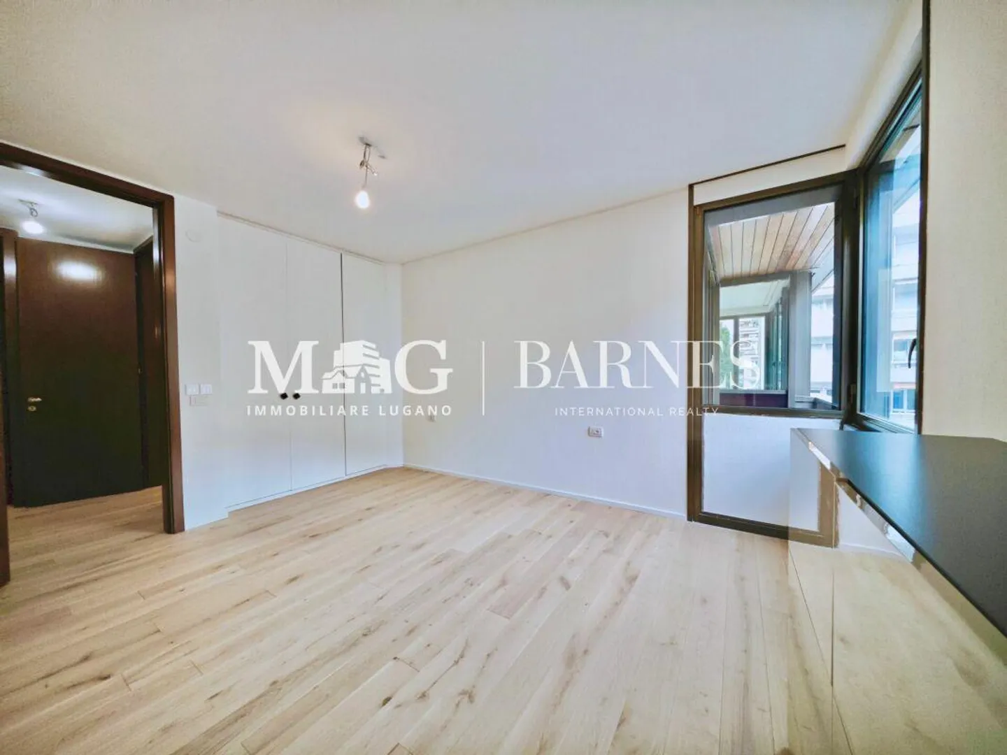 Lugano, Cassarate Apartment - RENOVATED - well laid out in a flat area, 3.5 rooms - Photo 8 of 10