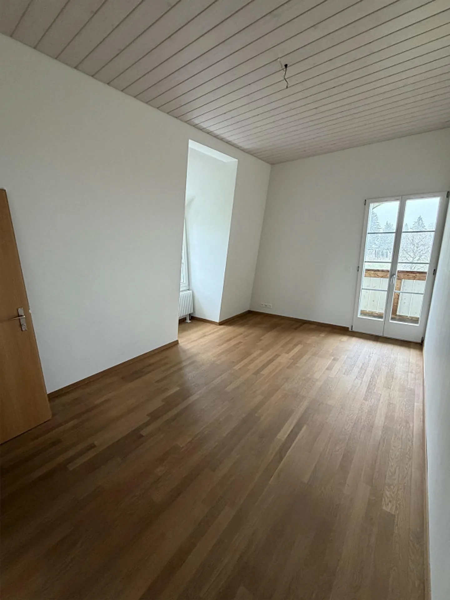 Bel appartement sous les combles, lumineux et bien isolé, avec vue sur la verdure - Photo 7 sur 12