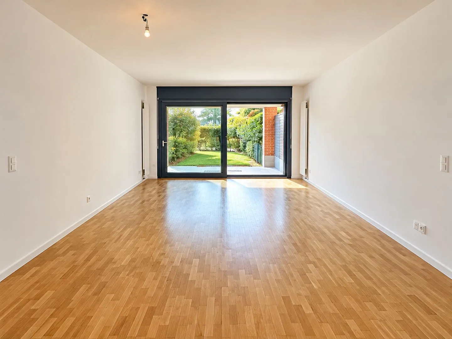 Geräumige Wohnung mit Garten - Foto 8 von 14