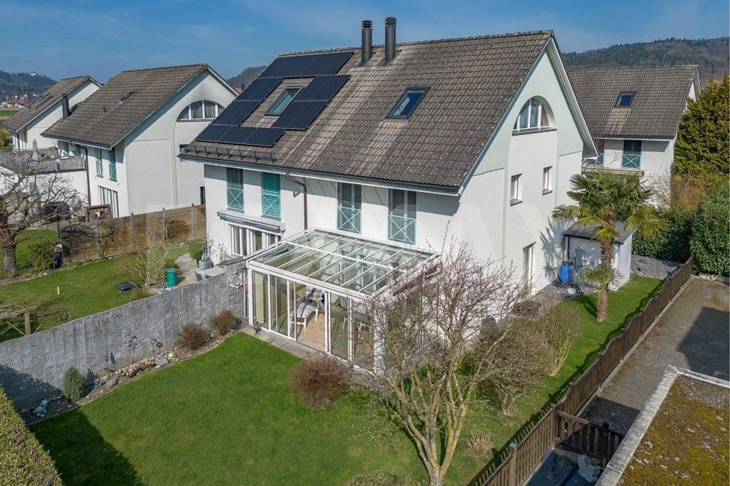 Maison jumelée de 4,5 pièces avec véranda - Photo 1 sur 13