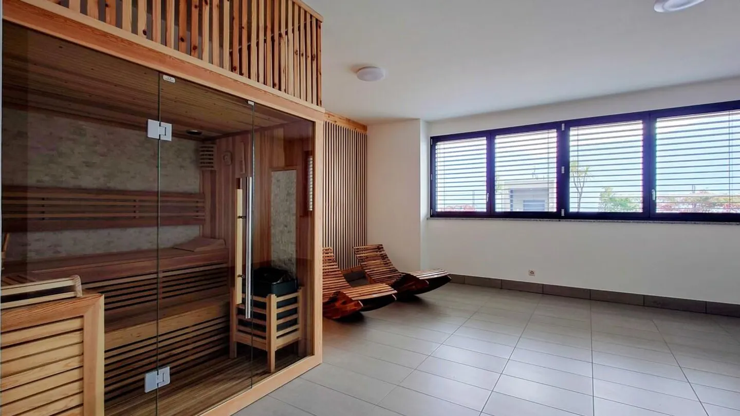 Appartamento 3.5 locali con vista illimitata e architettura senza tempo - Foto 11 di 13