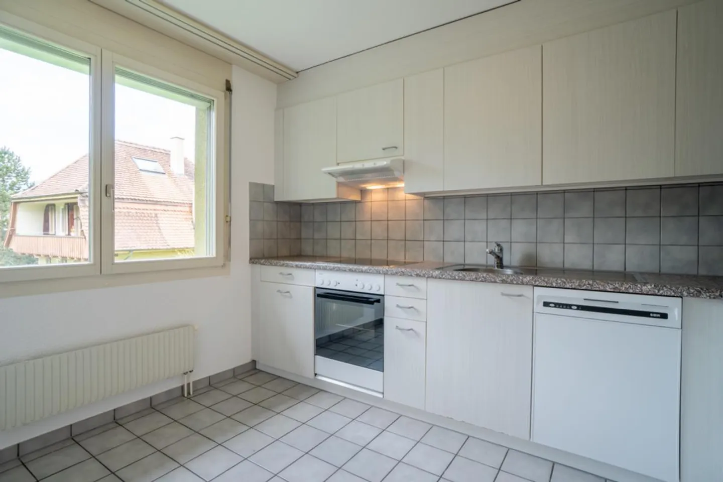 Appartement familial dans le vert - Photo 3 sur 7