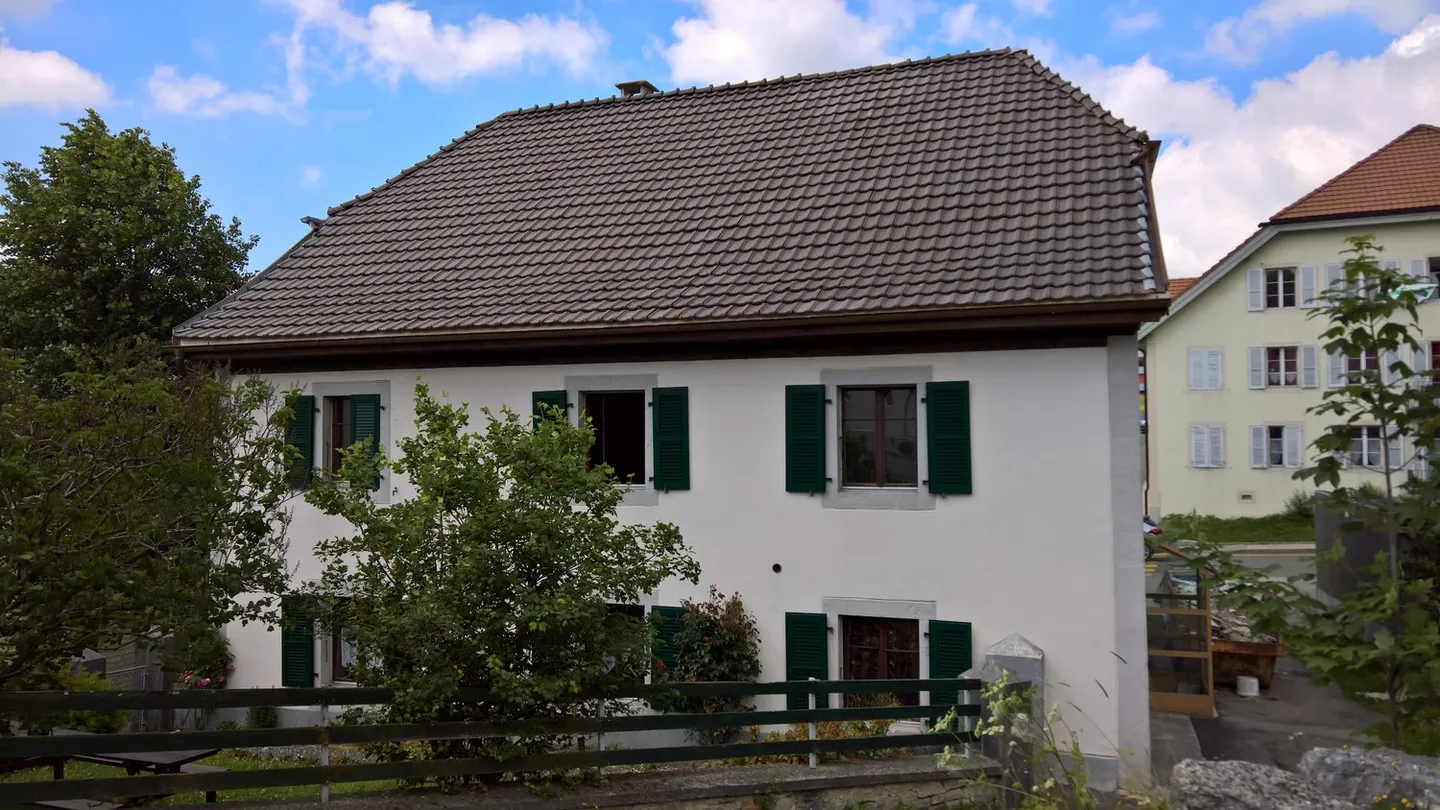 Grande maison avec deux appartements au centre de Saignelégier - Photo 3 sur 51