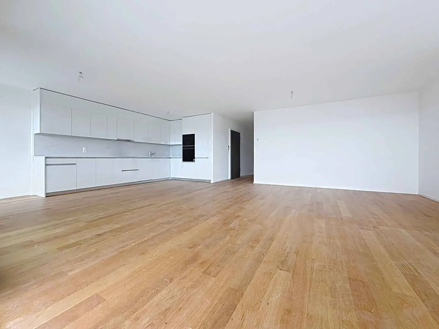 Luxuriöse 4.5-Zimmer-Wohnung mit überdachtem Balkon von 76m2 und Seeblick - Foto 3 von 13