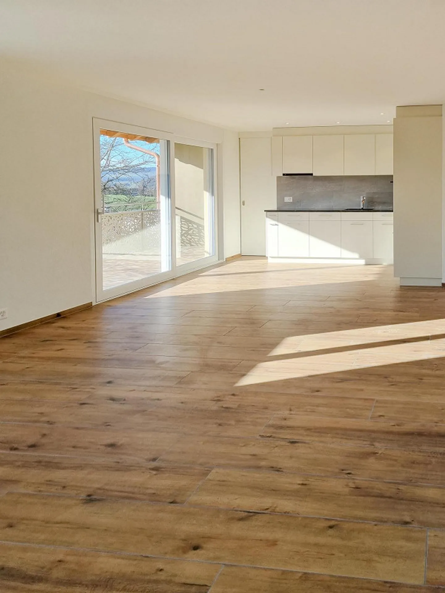 Appartement spacieux de 3,5 pièces avec espace jardin - Photo 2 sur 12