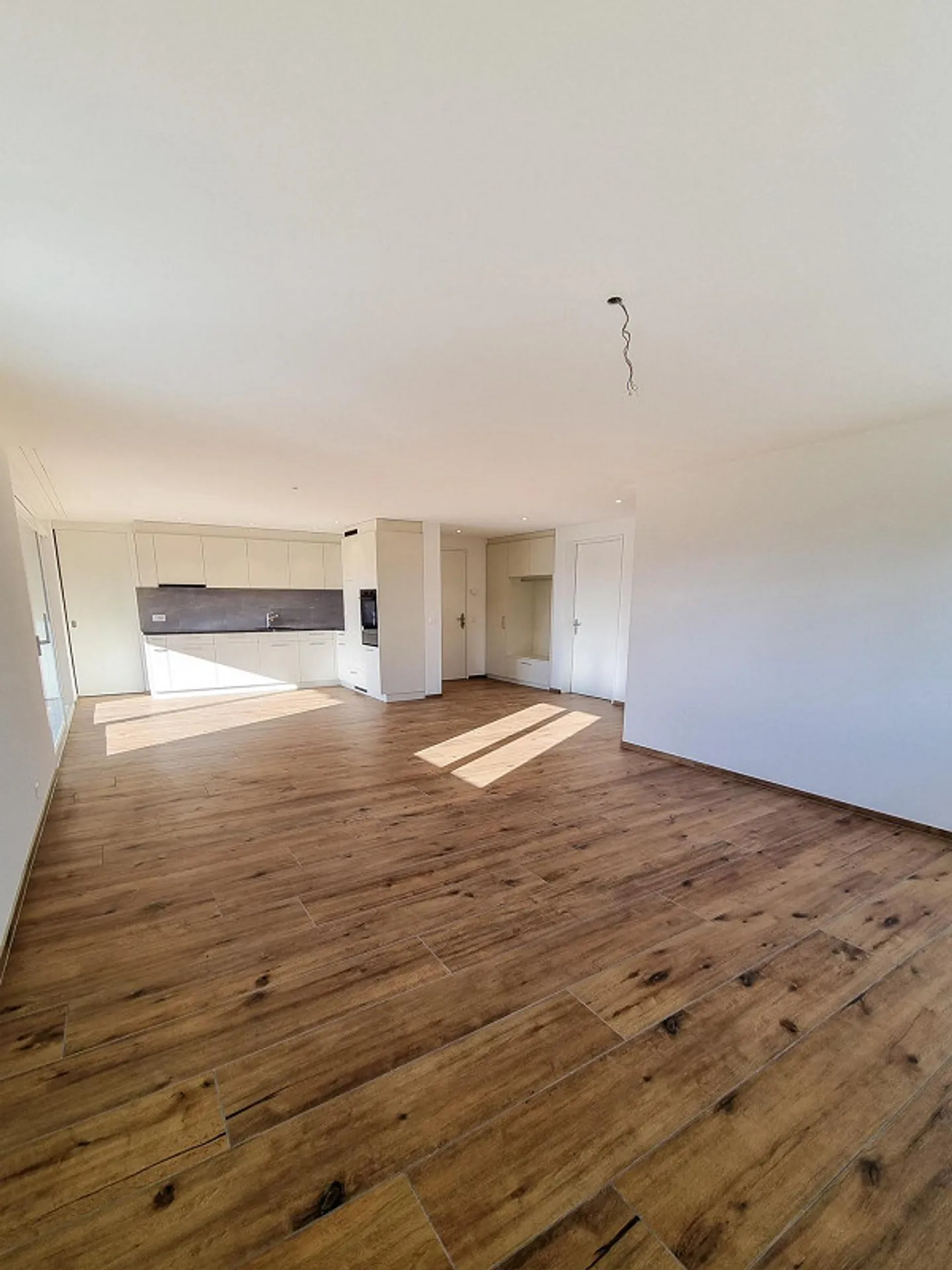 Appartement spacieux de 3,5 pièces avec espace jardin - Photo 3 sur 12
