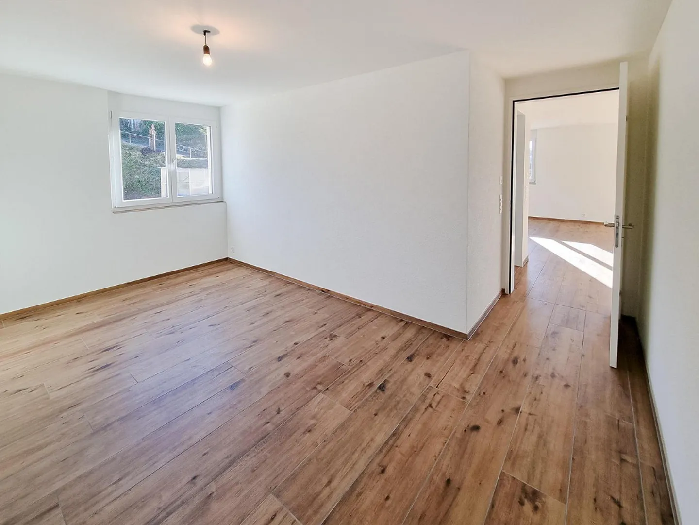 Appartement spacieux de 3,5 pièces avec espace jardin - Photo 7 sur 12