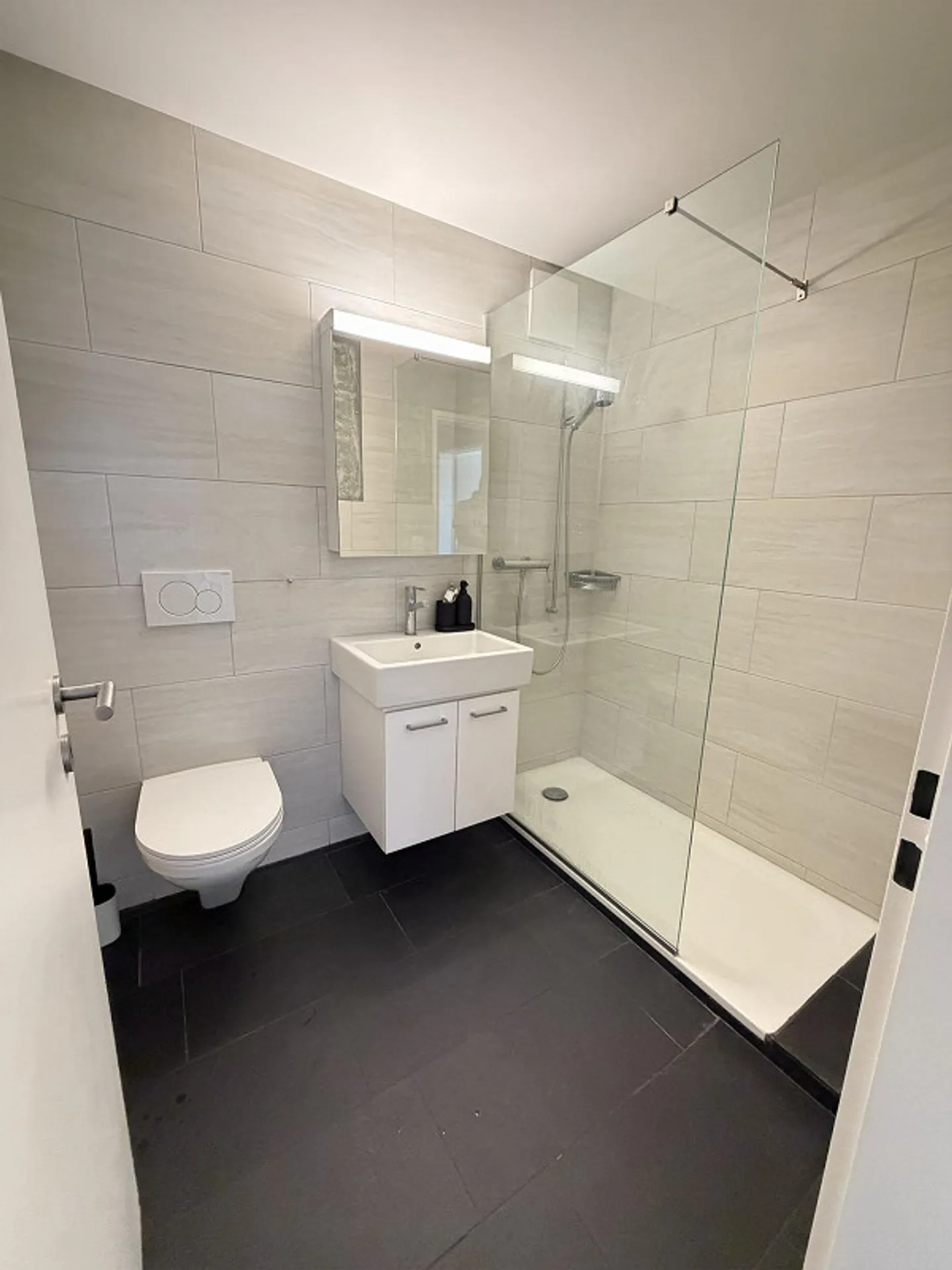 Appartamento 5.5 stanze con ampio soggiorno e balcone - Foto 11 di 11