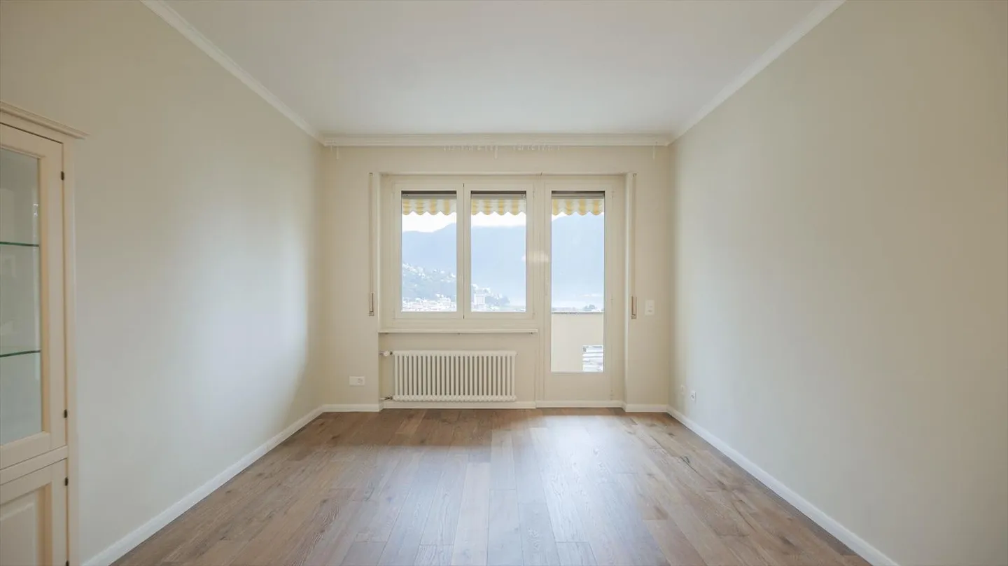 Renovierte 3,5-Zimmer-Wohnung mit Seeblick in Massagno - Foto 1 von 9