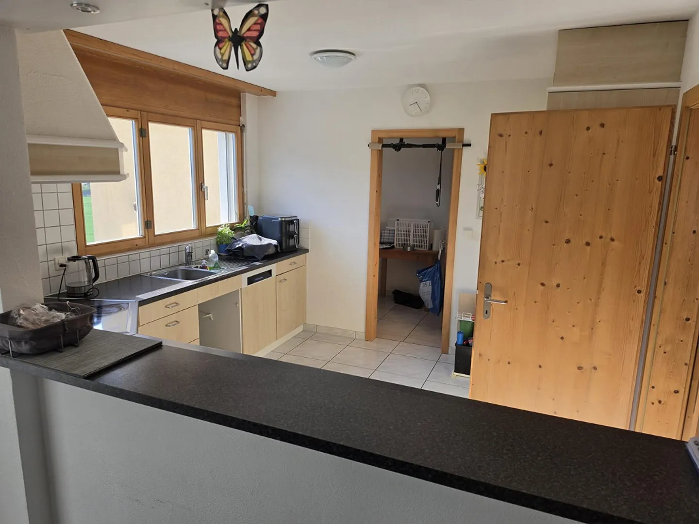 Geräumige Wohnung mit Terrasse - Foto 4 von 4