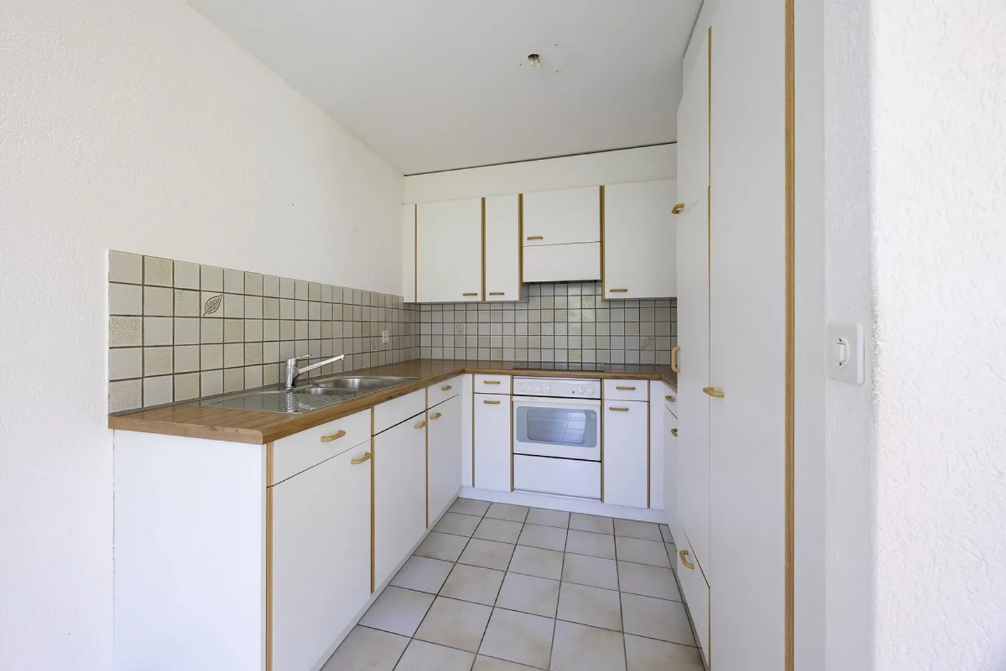 Appartamento giardino 2,5 locali con ascensore e garage singolo - Foto 4 di 20