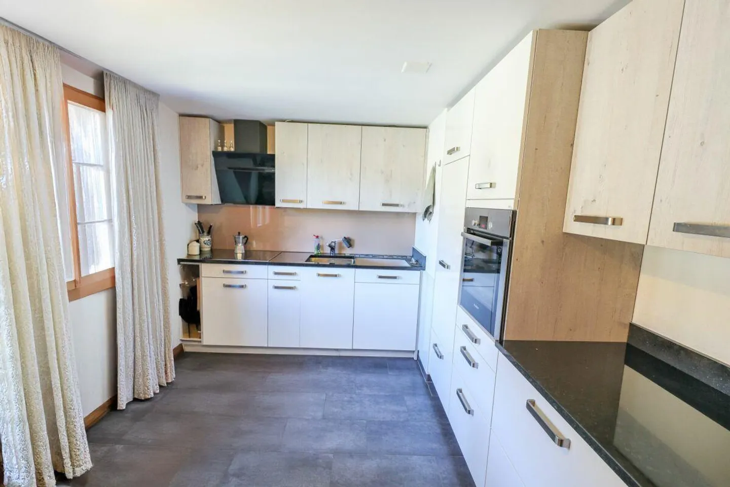 Appartamento accogliente di 4,5 stanze al piano rialzato con balcone - Foto 5 di 7