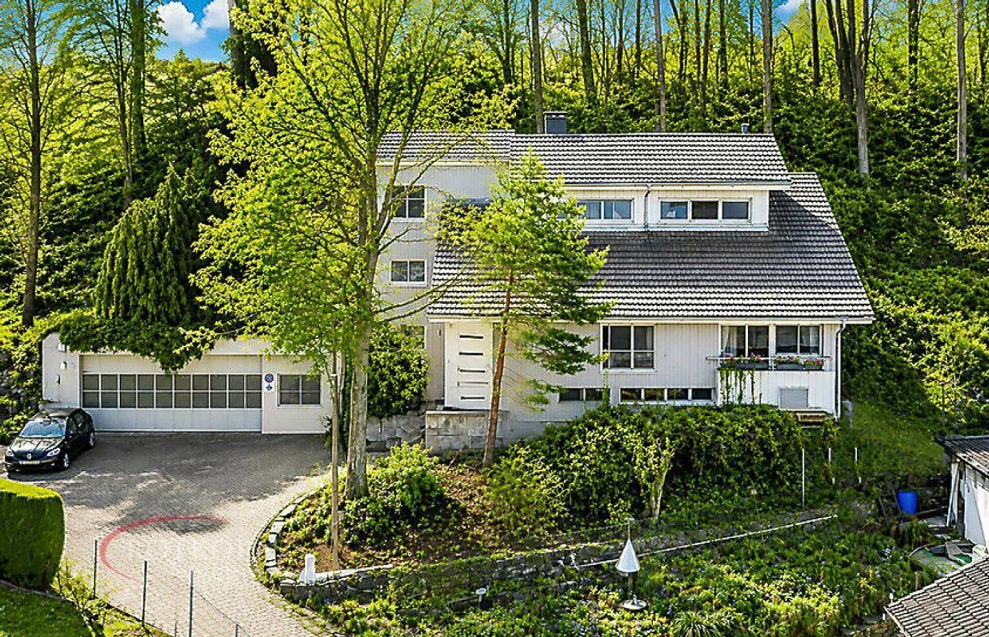 Geräumiges Einfamilienhaus mit Lagerhalle - Foto 1 von 24