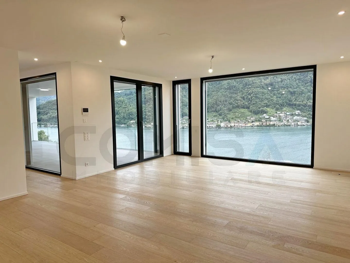 VICO MORCOTE
Nuova villa moderna di 7,5 stanze
Vista sul lago - Foto 4 di 10
