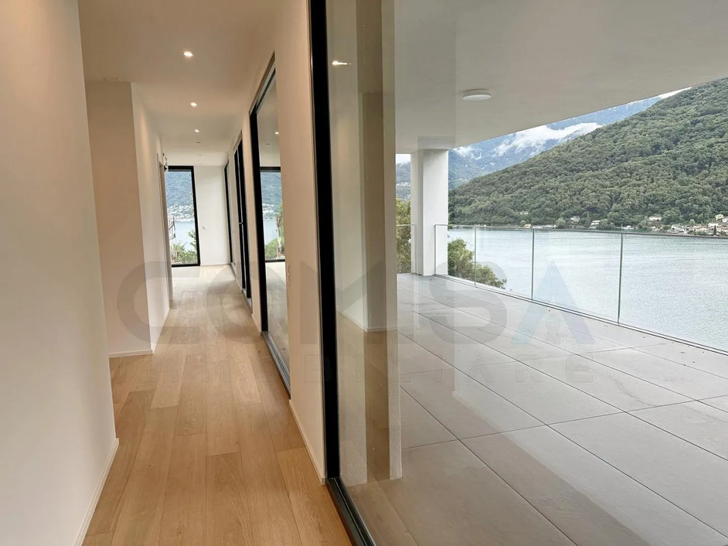 VICO MORCOTE
Nuova villa moderna di 7,5 stanze
Vista sul lago - Foto 5 di 10