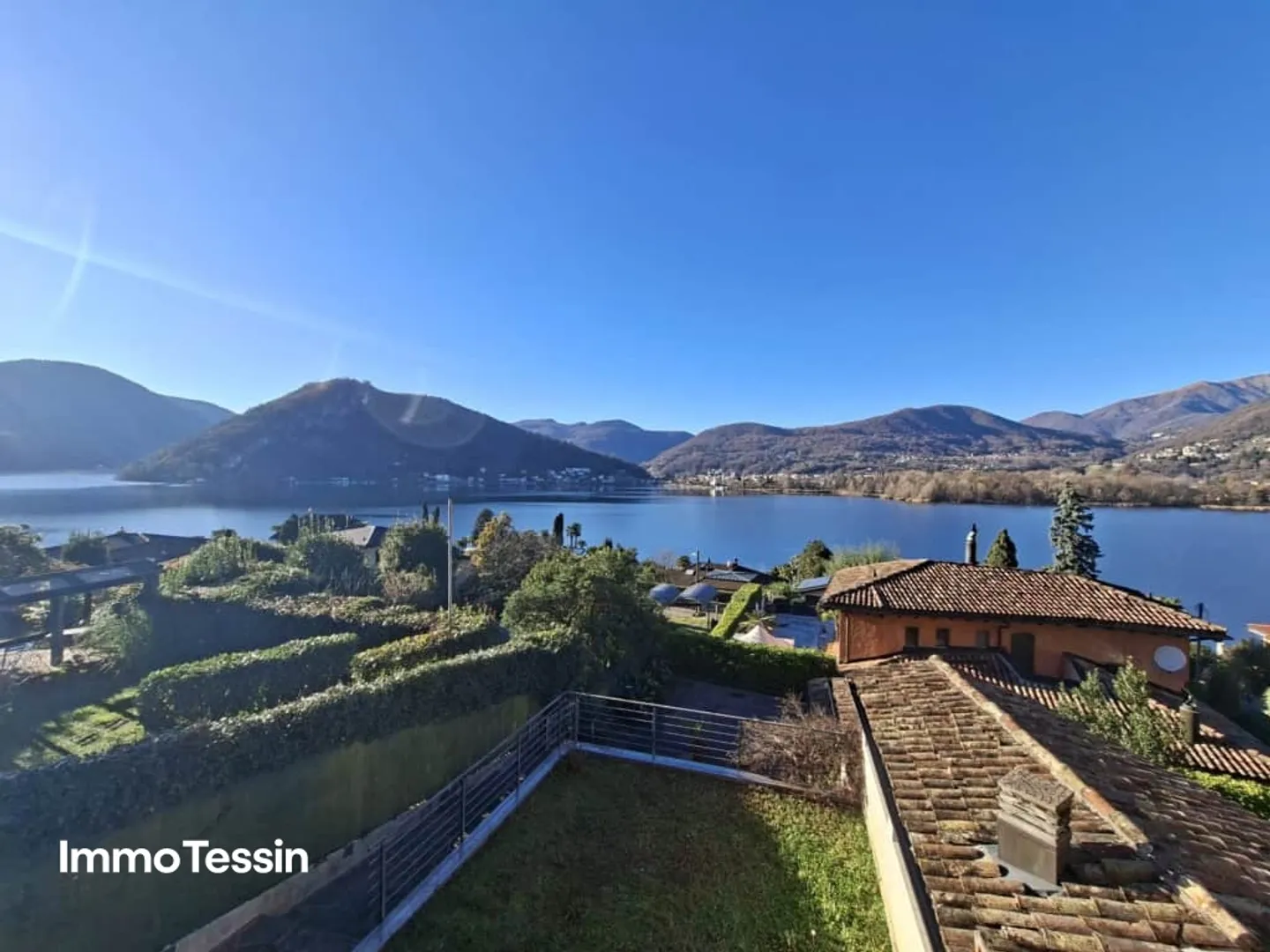OPPORTUNITY: Oasis of well-being with fantastic lake view on Lake Lugano in a very quiet and sunny location near Lugano - Photo 2 of 13
