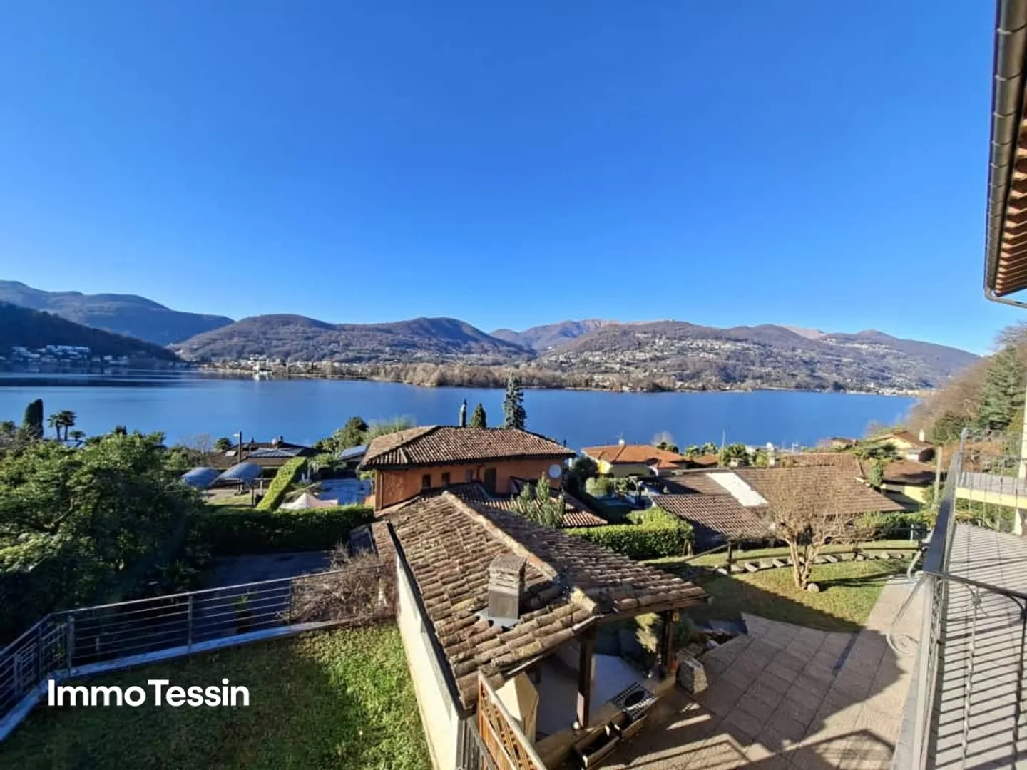 OPPORTUNITY: Oasis of well-being with fantastic lake view on Lake Lugano in a very quiet and sunny location near Lugano - Photo 3 of 13