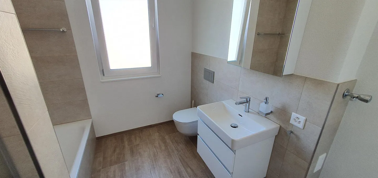 Appartement attrayant de 3,5 pièces avec patio au rez-de-chaussée à Tenniken - Photo 6 sur 11