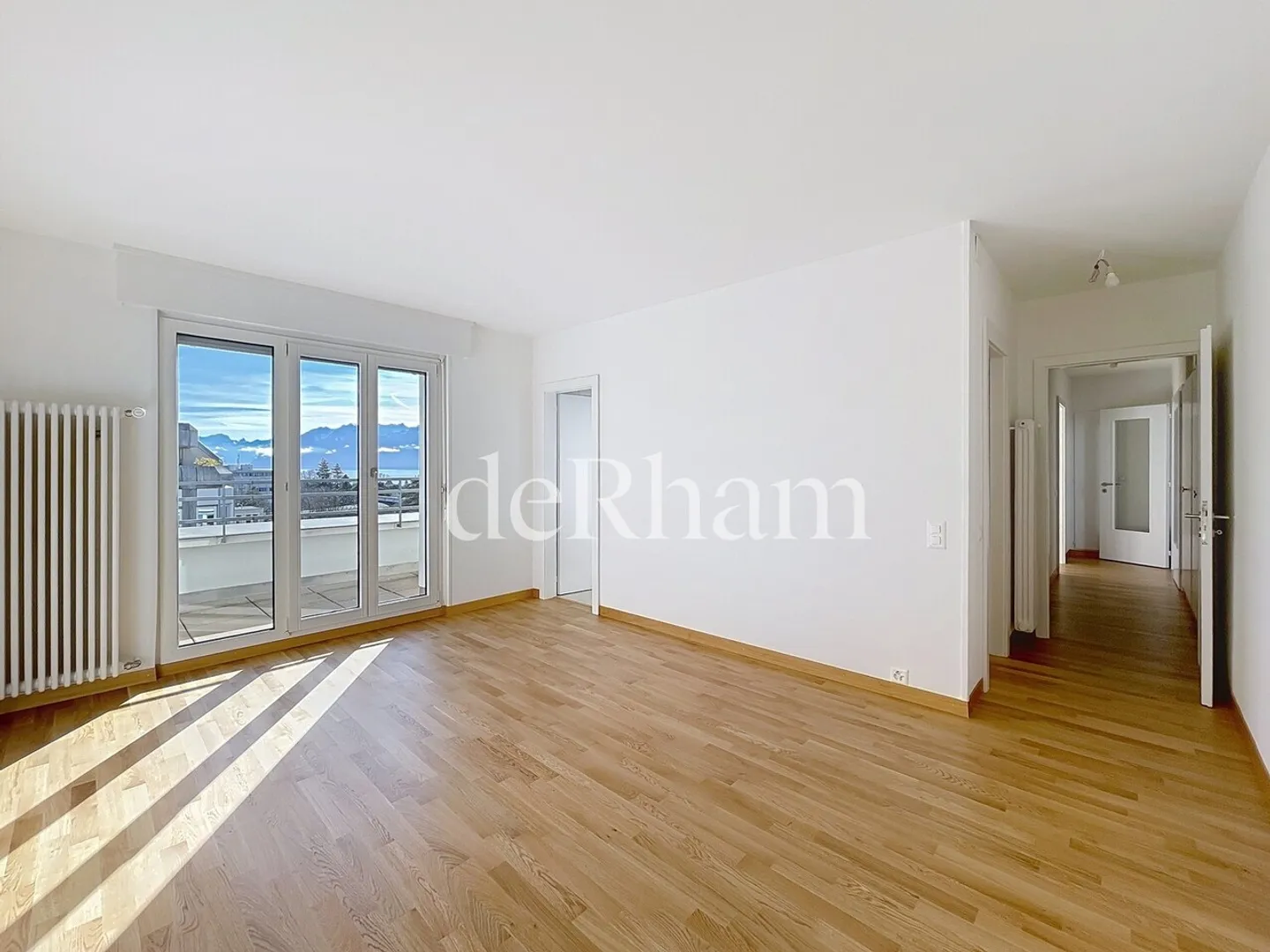 Penthouse rénové avec vue sur le lac - Photo 13 sur 13