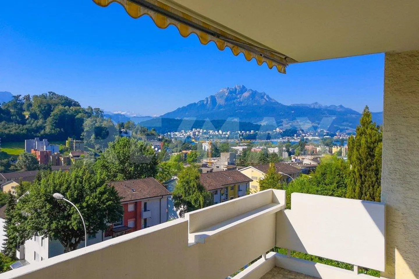 Appartamento 4½ locali con vista sul lago e sulle montagne - Foto 1 di 9