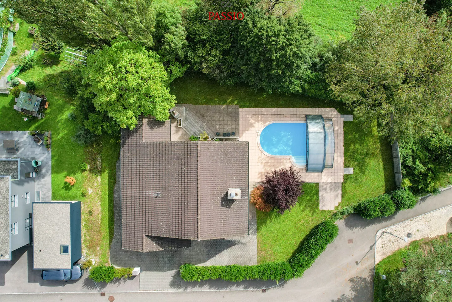 Einfamilienhaus mit 5,5 Zimmern, Swimmingpool und großem Garten - Foto 33 von 37