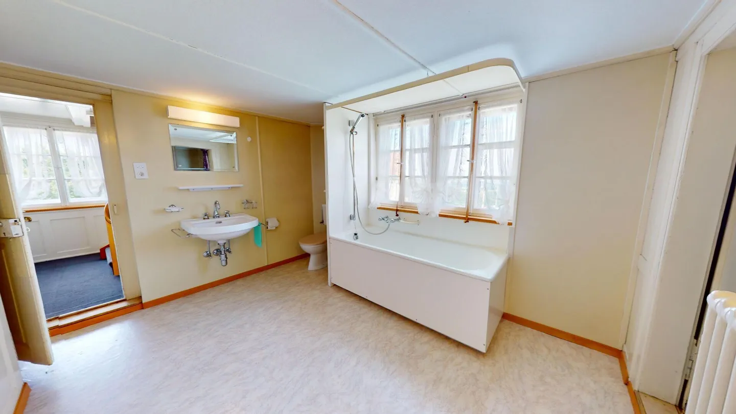 Casa bifamiliare con vista lago e giardino da sogno - Foto 7 di 10