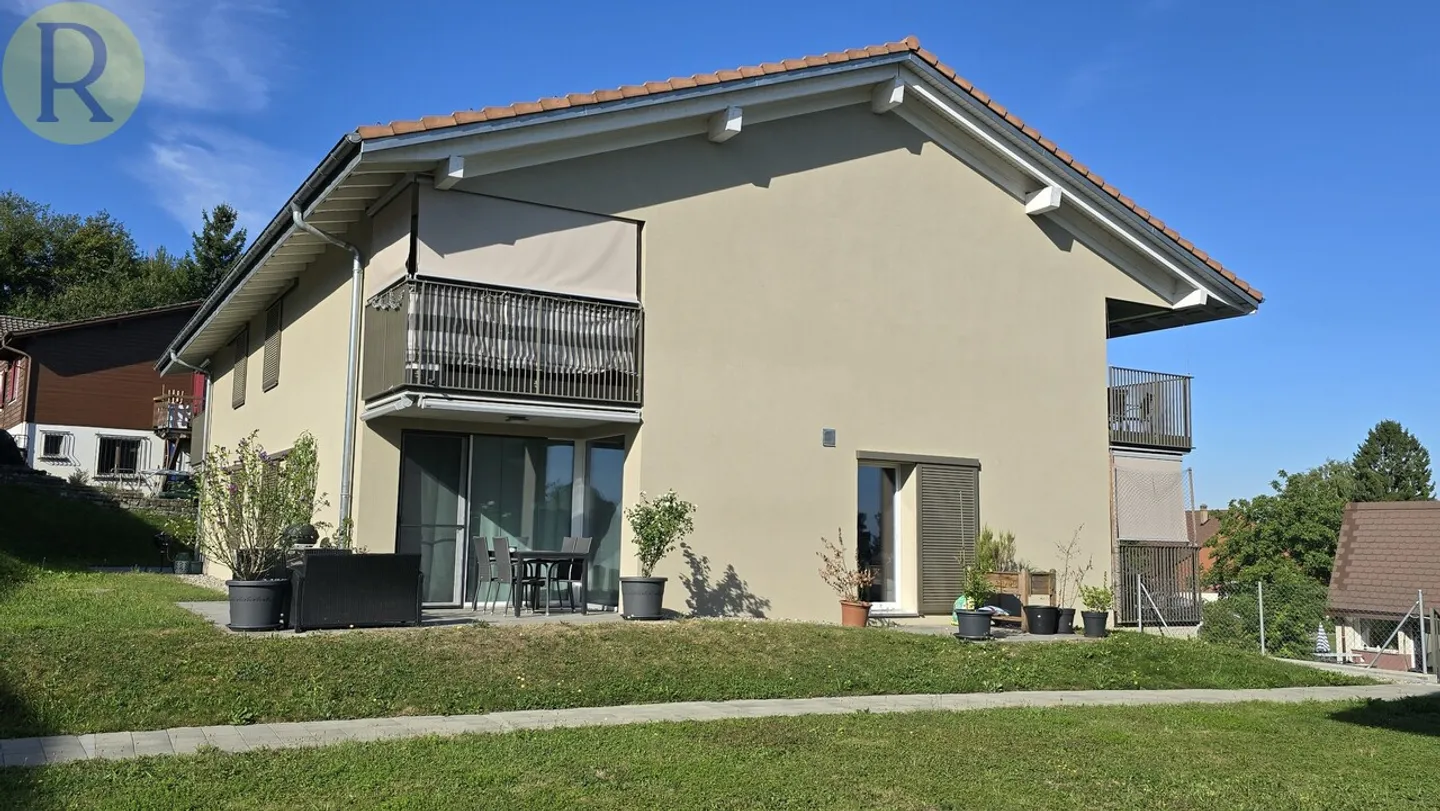 Bel appartement de 2,5 pièces avec jardin et loggia - Photo 1 sur 11