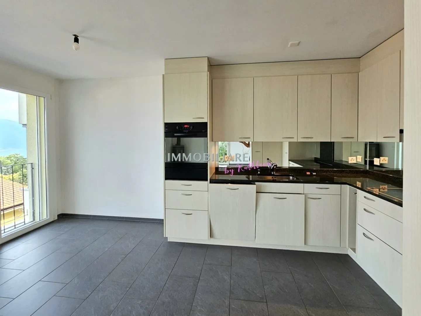 Duplex with 2 large terraces, garden share and partial lake view, primary residence - Photo 5 of 13